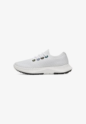 White athletic shoe with a textured knit upper, round laces, contrasting colored eyelets, and a thick white midsole with a black rubber outsole.