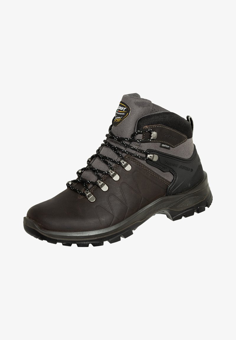 Braune Wanderschuhe mit einer strukturierten Oberseite, grauen Akzenten, einer strapazierfähigen Gummisohle, Metallösen und schwarzen Schnürsenkeln. Ideal für unebenes Gelände.