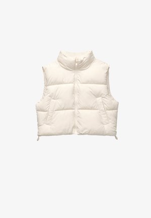 Puffervest i lys cremefarve med høj krave, frontlynlås, to sidelommer og quiltet tekstur med en cropped design.