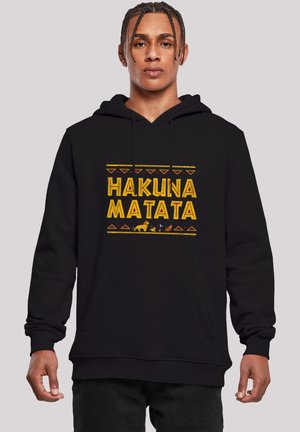 Black hoodie featuring "HAKUNA MATATA" in yellow text, decorated with geometric patterns and animal silhouettes. Soft fabric, front pocket.