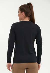 Endurance MIDLAYER - Langærmet T-shirt -  black