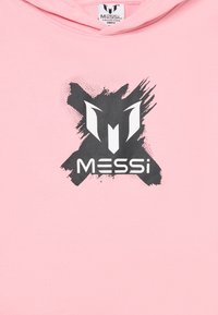 Hoodie rose clair en coton, avec un design graphique noir représentant un logo et le texte "MESSi" sur le devant.