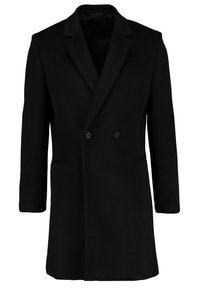 Cappotto doppiopetto nero in lana, con collo a scollo a V, due tasche frontali e una vestibilità su misura. Texture liscia e design minimal.