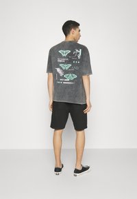 Levi's® LOOSE - Pantaloni scurți din denim - black