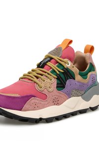 Multicolored sneaker featuring pink, purple, green, and brown suede and mesh materials, textured accents, and black rubber sole with ridges.