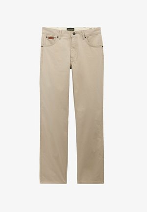 Beige straight-leg Wrangler pants with front pockets, belt loops, button closure, and visible brand label on the waistband.