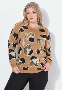 Brązowy sweter w czarno-kremowy leopardi wzór, z dodatkiem złotych cekinów. Żebrowane mankiety i dół, miękka dzianinowa faktura.