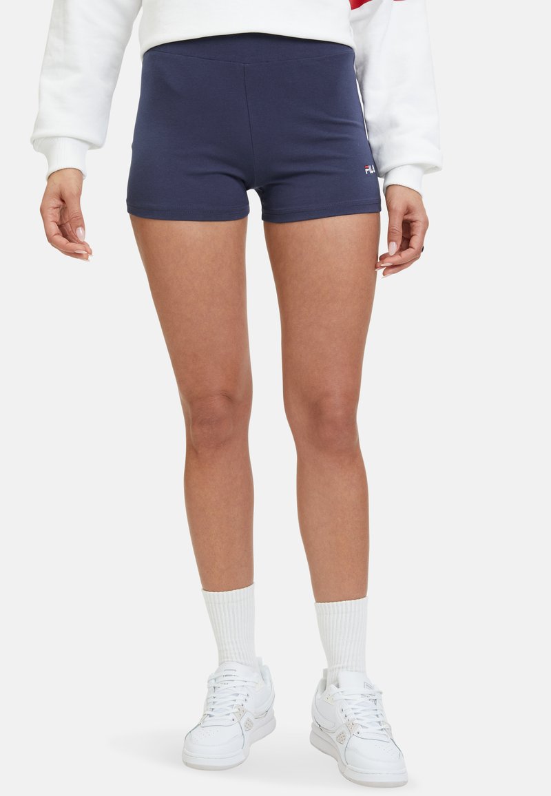 Marineblauwe strakke short gemaakt van rekbare stof met een geribbelde tailleband, met een klein logo aan de linkerkant.