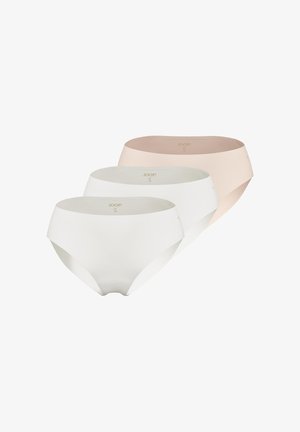 Tre sømløse damestrusser i beige, lysegrå og hvid, vist stablet med synlige indvendige størrelses- og mærkelapper.