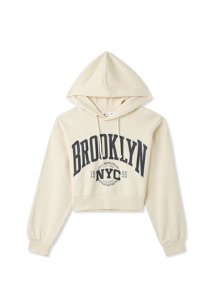 Felpa corta color crema con cappuccio regolabile. Presenta una stampa grafica "BROOKLYN NYC 1995" in grigio scuro, con polsini e orlo ribattuti.