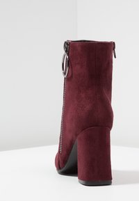 Anna Field Tronchetti - dark red