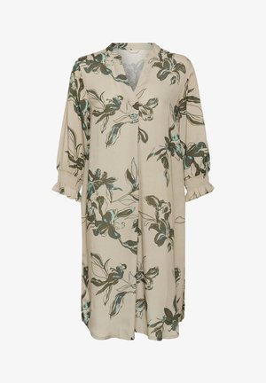 Vestido con estampado floral en beige, cuenta con un escote en V y mangas tres cuartos con puños elásticos. Está hecho de un tejido ligero con una textura suave.