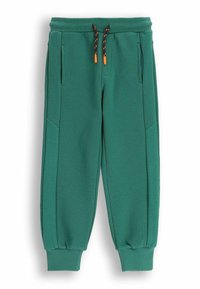Zielone spodnie dresowe o miękkiej fakturze, wyposażone w boczne kieszenie, pikowane akcenty oraz pomarańczowy regulowany sznurek.