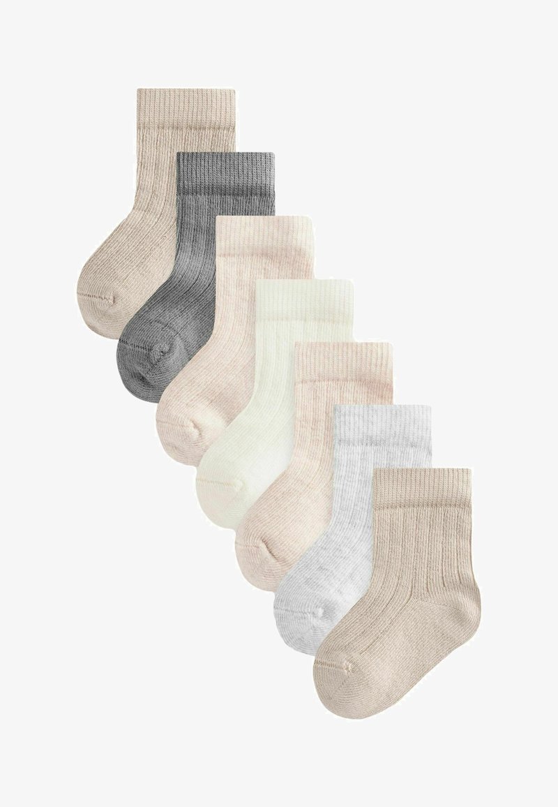 Astoņu ribotu zeķu komplekts dažādās neitrālās krāsās: bēša, pelēka, netīri balta un gaiši rozā. Katrai zeķei ir mīksts, teksturēts adījuma dizains.