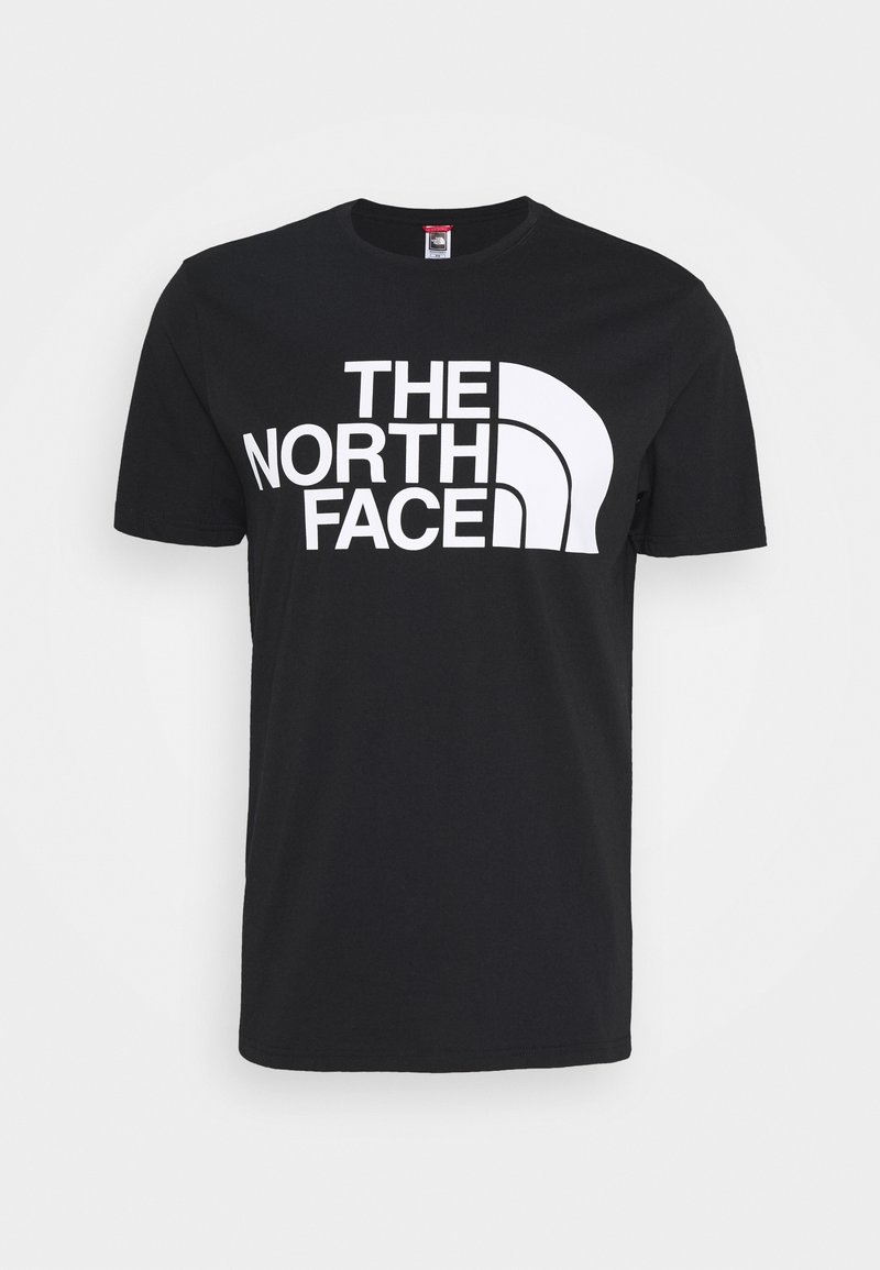 Svart bomullströja med stor vit text "THE NORTH FACE" och en vit halvmåne-logotyp på framsidan; korta ärmar och rund hals.