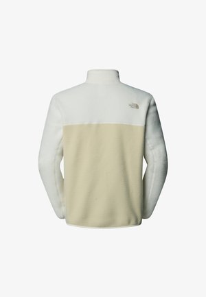 Fleece jacket featuring a white upper and beige lower section, designed with a high collar and the North Face logo in light gray.