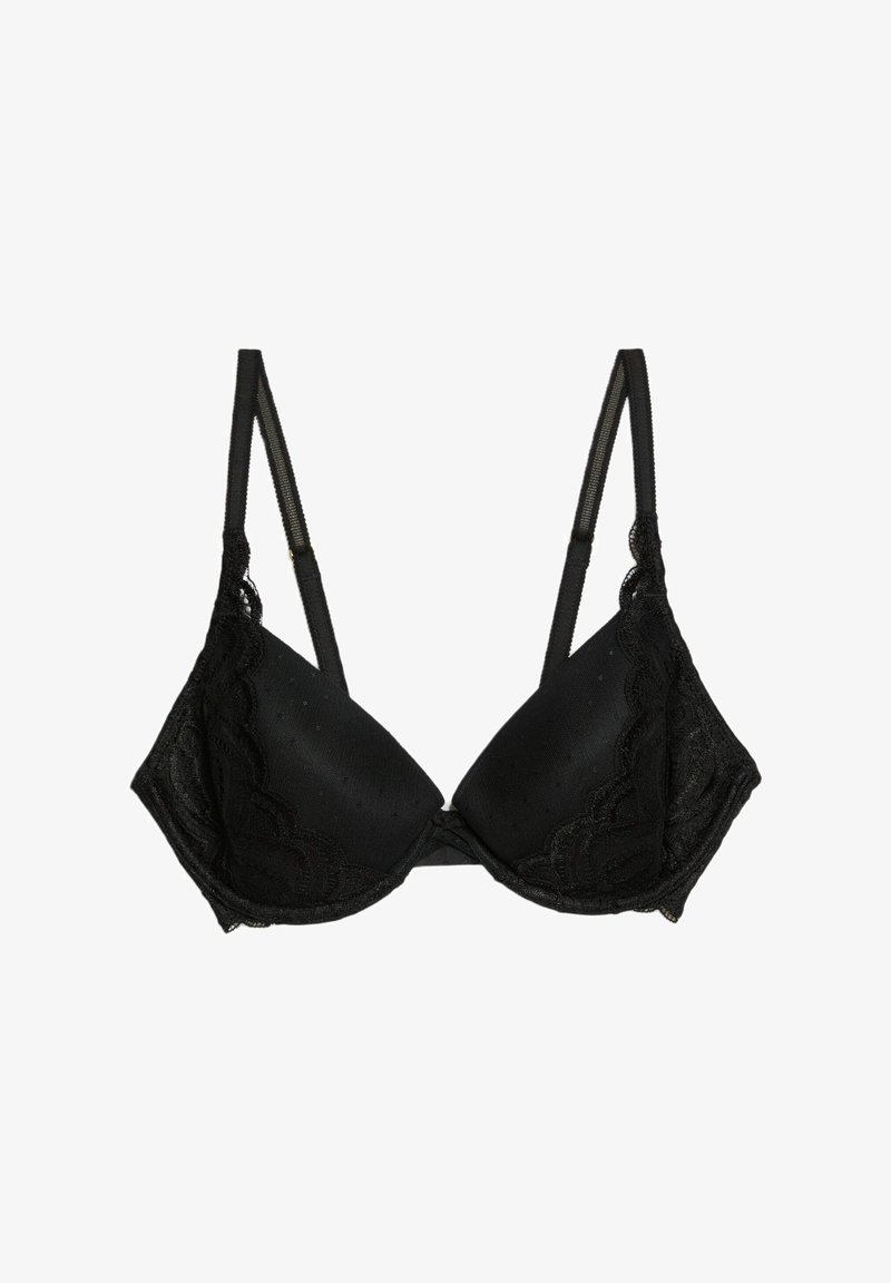 Reggiseno nero in pizzo con coppe imbottite e bordi ondulati. Spalline regolabili e chiusura a gancio sul retro. Texture liscia con motivo a pois.