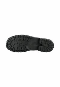 Suela de zapato de goma negra con surcos profundos y varios patrones para tracción, que presenta una superficie lisa y un diseño de tacón rectangular.