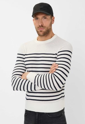 Striped cotton sweater with a round neck, featuring navy blue and white horizontal stripes, ribbed cuffs, and a navy cap.