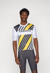 Korte ermede sykkelskjorte med et svart, gult og hvitt diagonalt stripemønster, med glidelås foran og teksturert stoff.