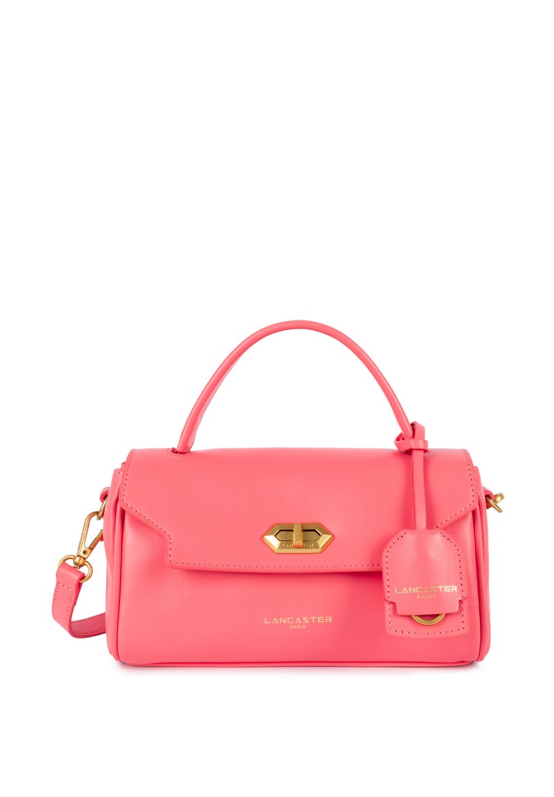 Borsa a mano in pelle rosa con design strutturato, hardware dorato, manico superiore e etichetta removibile con branding in rilievo.