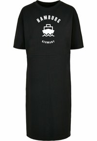 Czarna sukienka t-shirt z okrągłym dekoltem, krótkim rękawem i nadrukiem z napisem "HAMBURG" oraz grafiką łodzi w kolorze białym.