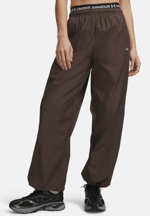 Under Armour, ICON WOVEN - Trousers - peppercorn