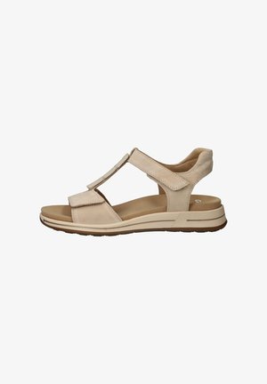 Beige open-toe sandal with adjustable velcro straps, cushioned footbed, and low rubber sole for comfort and support.
