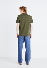 Levi's® Polo majica - olive night
