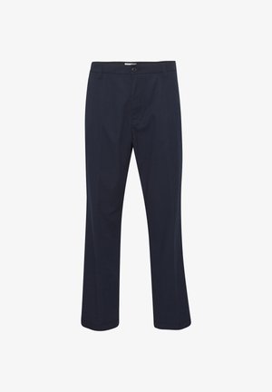 Tumši zili bikses, izgatavotas no kokvilnas maisījuma auduma, ar pogu aizdari, plakanu priekšpusi, taisnām kājām un sānu kabatām.