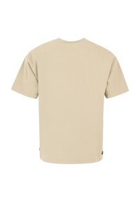 Beige T-shirt met korte mouwen en een ronde halslijn, met een rechte snit. Gemaakt van zachte katoen, met minimale branding aan de onderzijde.