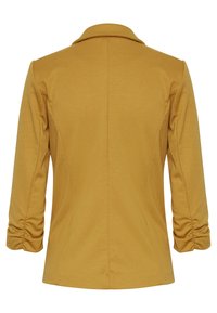 Blazer jaune moutarde avec manches longues froncées et une simple couture au dos, présenté sur un fond blanc.