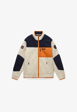 Krémszínű testű, sötétkék ujjú, narancs részletekkel ellátott fleece dzseki. Cipzáras zsebekkel és magas gallérral rendelkezik. Texturált, puha felület.