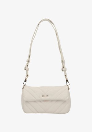 Gequilte lichtbeige handtas met een bovenklep, verstelbare schouderriem en hardware in goudkleur. Heeft een chevronpatroon over het oppervlak.