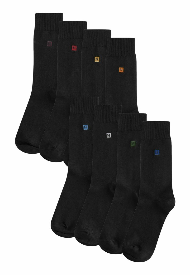 Black socks with a smooth texture, featuring small colored "N" logos in red, yellow, blue, gray, and green on the cuff. Set of eight pairs.
