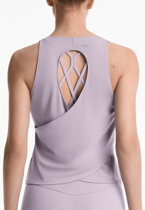 Lavender athletic tank top featuring a crisscross back design and a relaxed fit, made of smooth, breathable fabric.