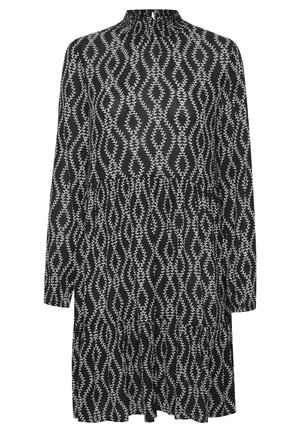 Un vestido negro con un alto escote, mangas largas y un diseño en capas, adornado con un patrón abstracto de hojas blancas en toda su superficie.