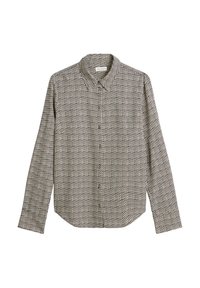 Chemise à manches longues noire et blanche à motifs, avec un col pointu et un bouton sur le devant, présentant des formes géométriques et une texture de tissu lisse.