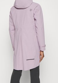 Light purple waterproof coat with a hood, pleated back detail, and a gray accent strip at the bottom. Subtle logo on the upper back.
