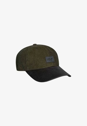 Corduroy cap in olive green with a black brim; features a textured surface and a rectangular leather tag on the front.