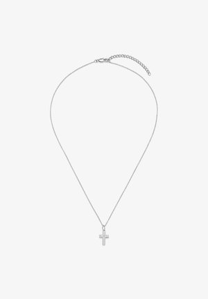 Collier délicat en chaîne d'argent avec petit pendentif croix scintillant et fermoir réglable sur fond blanc.