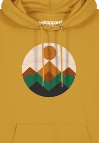 Geel hoodie met een ronde graphic van een berg- en zonontwerp in bruin, groen en zwarte kleuren. Trekluiken met metalen uiteinden.