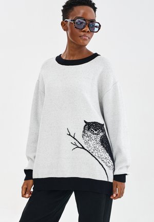 - Sweter