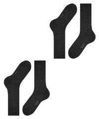 Calcetines negros con una textura suave y un puño acanalado, presentados en pares con diferentes longitudes, etiquetados con la marca "FAAKE."