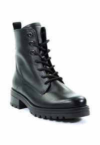 Zwarte leren enkellaars met een ronde neus, vetersluiting aan de voorkant, zilveren ogen en een dikke, robuuste zool. Voorzien van een lusje aan de achterkant.