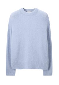 Lichtblauwe, oversized trui gemaakt van zacht, pluizig materiaal. Heeft een ronde halslijn en geribde manchetten en zoom. Eenvoudig ontwerp, geen patronen.