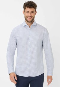 Witte en lichtblauwe geblokte shirt met een spread collar, lange mouwen, knoopsluiting en kleine blauwe stippen door de stof.