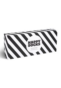 Boîte cadeau rayée noir et blanc avec le logo « HAPPY SOCKS », contenant quatre paires de chaussettes pour adulte de type crew. Forme rectangulaire, finition mate.
