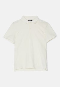 Kortärmad polo i mjuk krämfärgad tyg med nedvikt krage, treknappsstängning och diskret logotyp på vänster bröst.