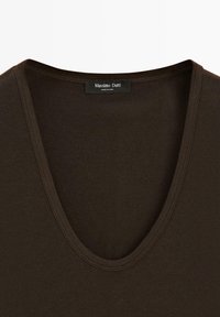 Dark brown V-neck cotton shirt with visible stitching along the neckline and a Massimo Dutti label at the collar.